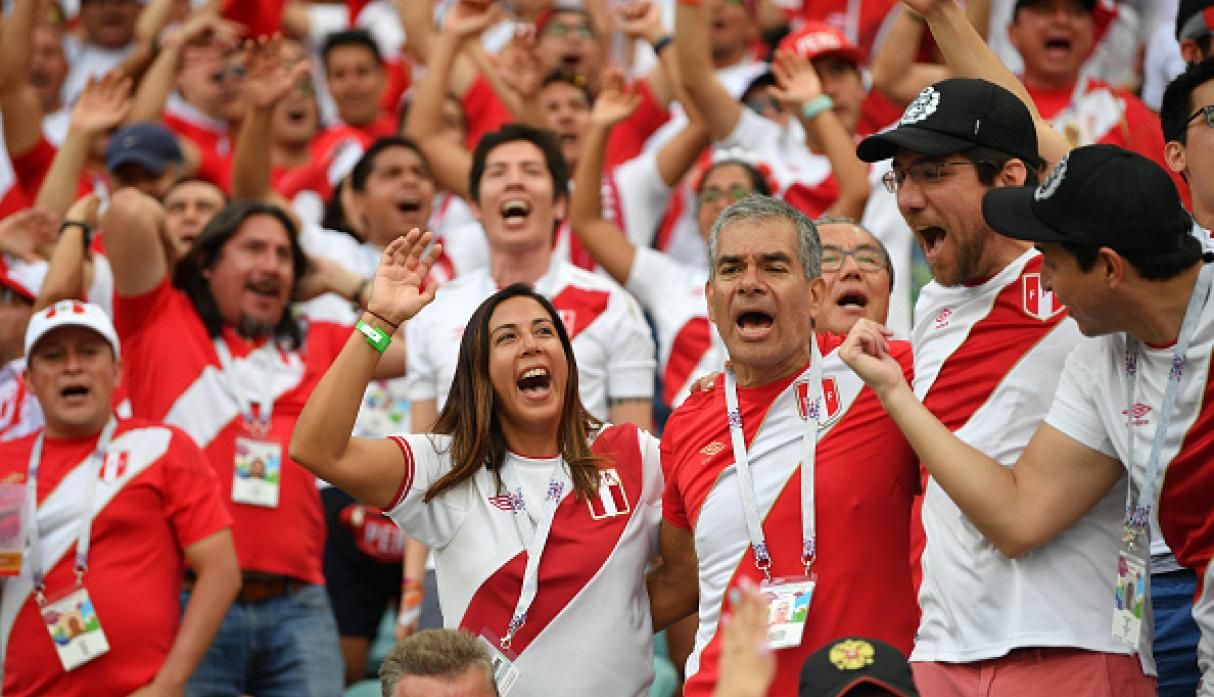 Peruvian fans celebrating at a game